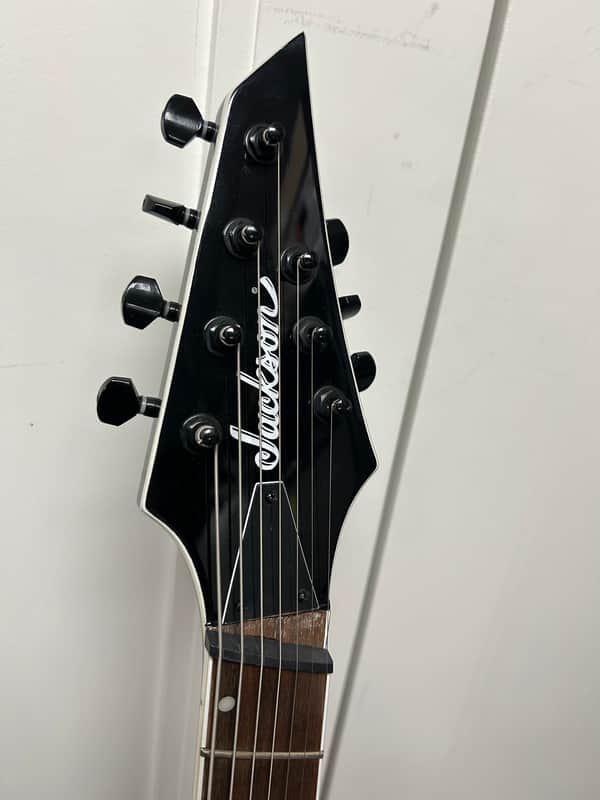 Jackson X Series SLATX7Q MS Soloist Archtop 7 String Multiscale Electric Guitar - Transparent Blue Burst