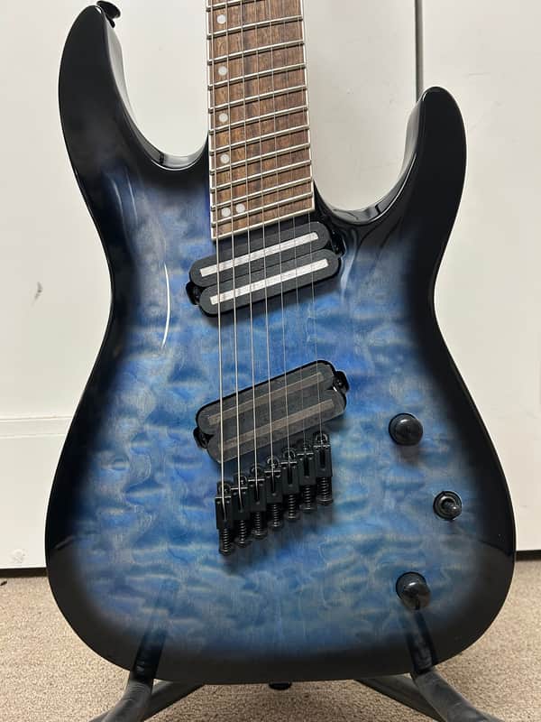 Jackson X Series SLATX7Q MS Soloist Archtop 7 String Multiscale Electric Guitar - Transparent Blue Burst