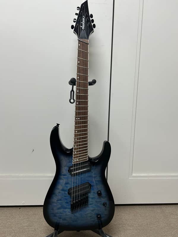 Jackson X Series SLATX7Q MS Soloist Archtop 7 String Multiscale Electric Guitar - Transparent Blue Burst