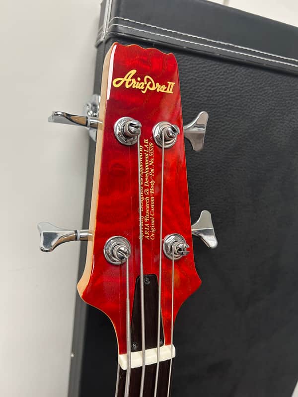 Aria Pro II SB-700 Four String Bass Guitar - Paduak Red w/Free Hard Case
